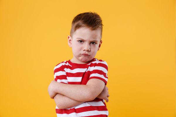 emotionally withdrawn child expressing frustration