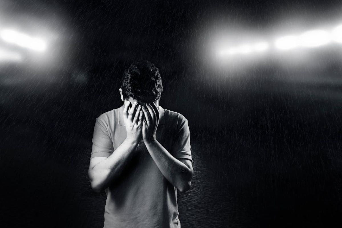 man in emotional distress representing the impact of a court-ordered mental psychological evaluation