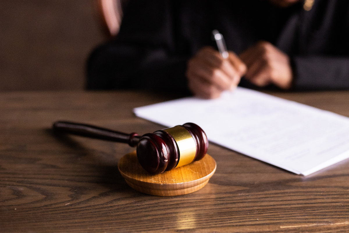 Judge writing a court-ordered therapy referral