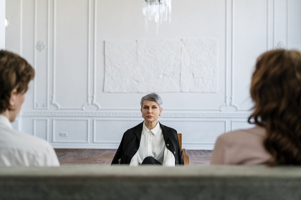 A couple undergoing court-ordered marriage counseling