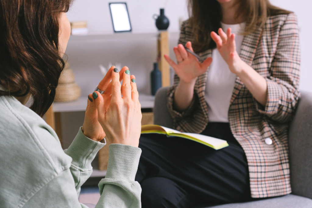 A woman speaking to her court-ordered therapist.