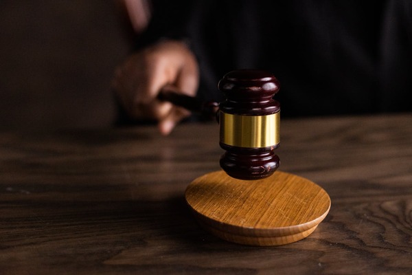 A judge using a gavel