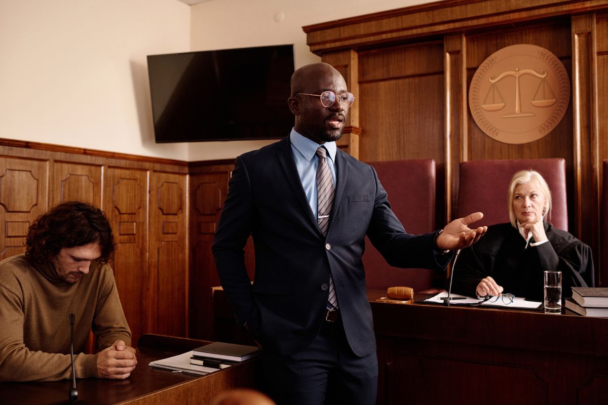 An attorney addressing the courtroom during a trial.