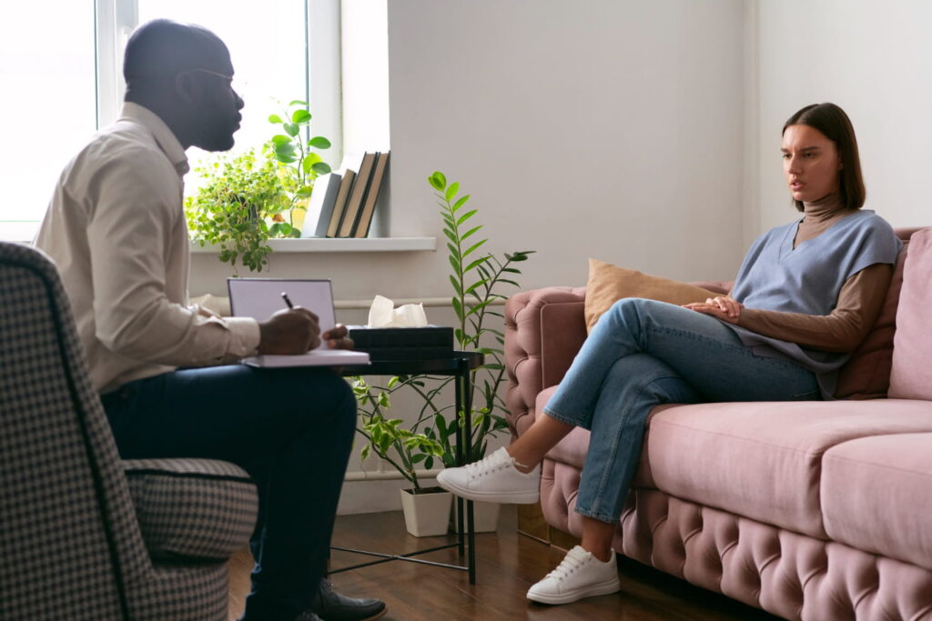 A woman sharing her thoughts with the psychologist