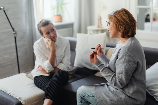 Woman undergoing forensic psychological consultation session