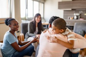 A family attends a family therapy session.