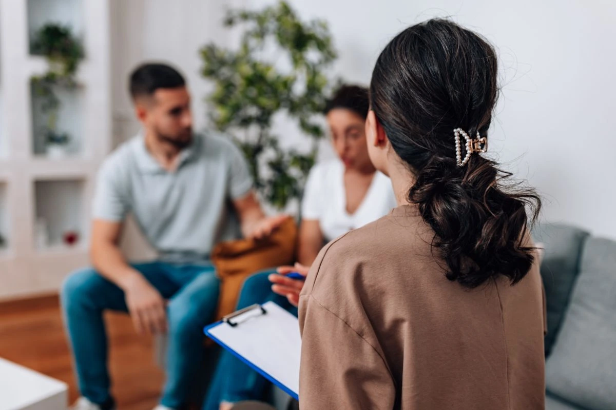 Couple attending co-parenting counseling session