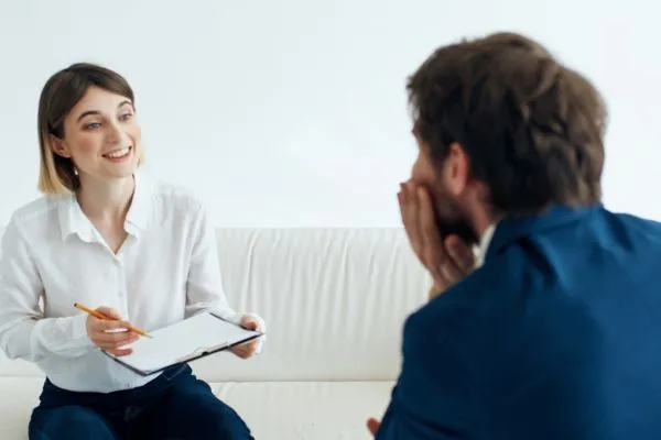 Man speaking with a psychologist