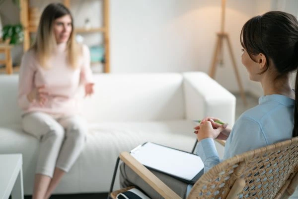 Woman undergoing neuropsychological evaluation assessment