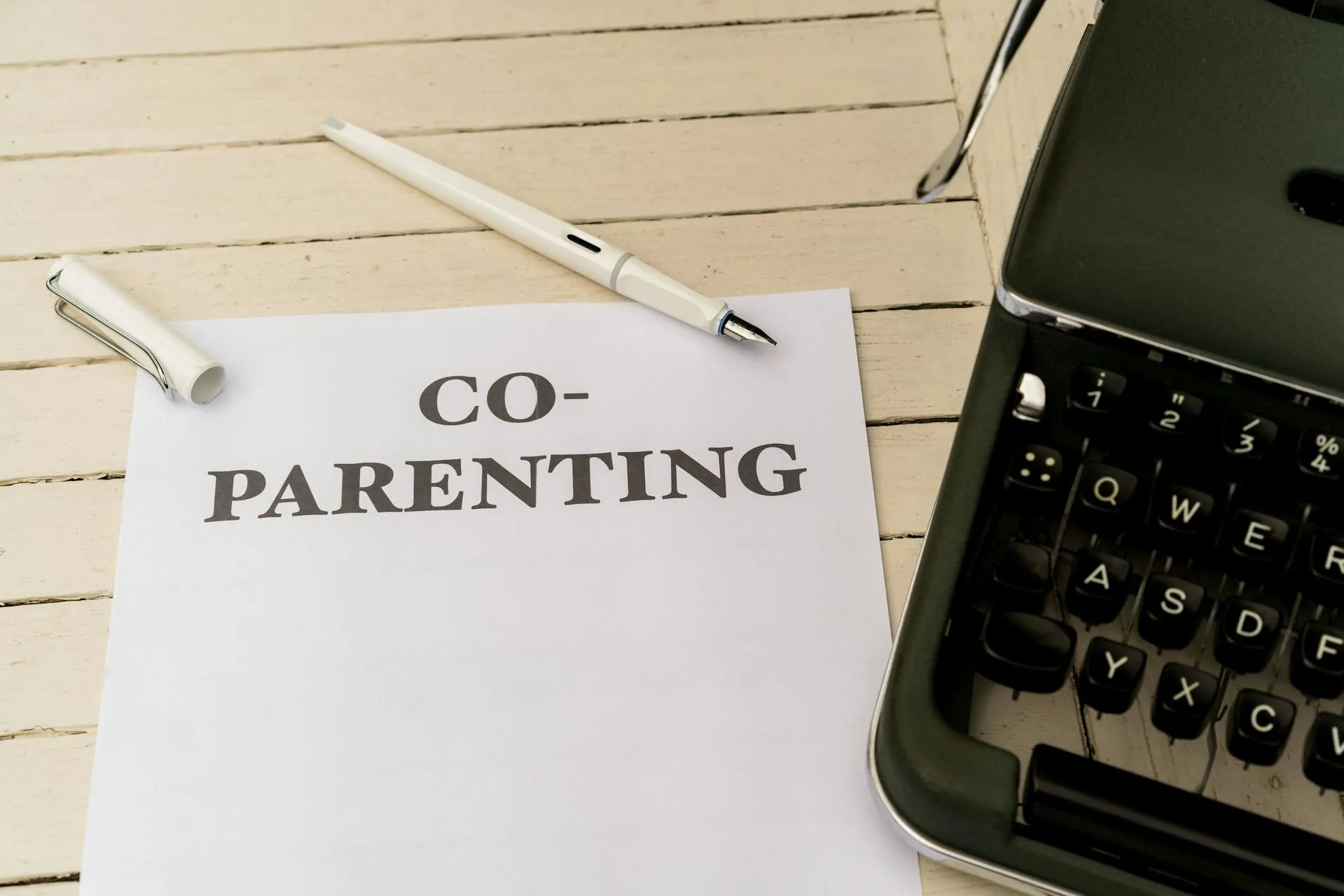 A printed paper with the word co-parenting written on it