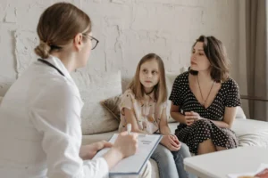 a mom and daughter undergoing therapy