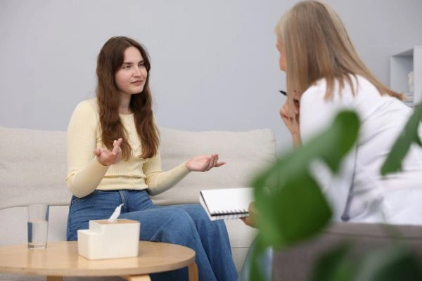 Woman in one-on-one psychology testing session