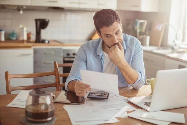 Man struggling with insurance-covered evaluation issue