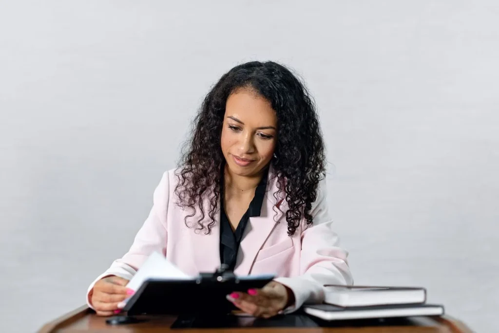 woman reading the assessments